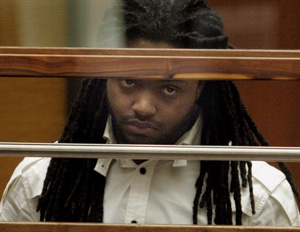 Aubrey Louis Berry appears in court Wednesday in the killing of Dolla, the stage name of Roderick Anthony Burton II. Berry remains in custody on $5-million bail on one count of murder and two counts of assault with a firearm. Credit: Spencer Weiner / Los Angeles Times