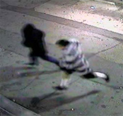 Photo: Two men shown running from the scene after shooting Pedro Mendez. Credit: LAPD.