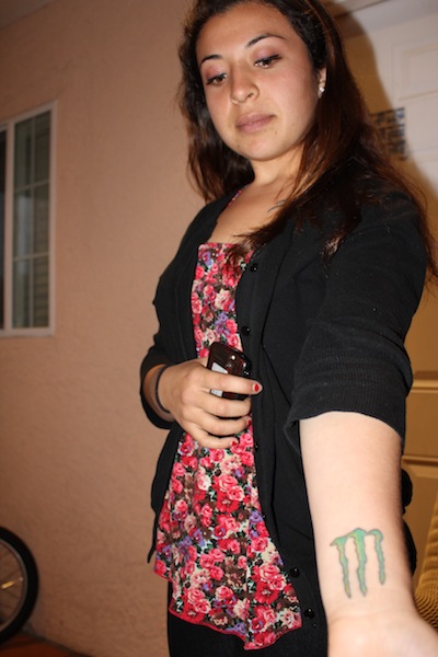 Photo: Crystal Lopez, 20, displays the Monster tattoo she got after the death of her friend, Daniel Silva. Credit: Mary Slosson