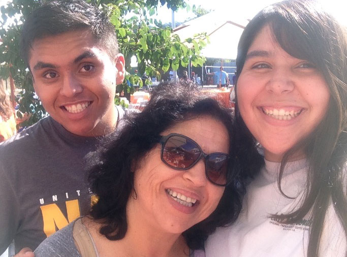 Nicholas Carrera, 23, and family.