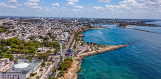 Aerial view of the Santo Domingo Malecon boardwalk, showing the beach and sea.