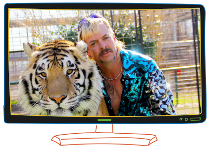 Joe Exotic of "Tiger King" holds one of his tigers in a still within television screen