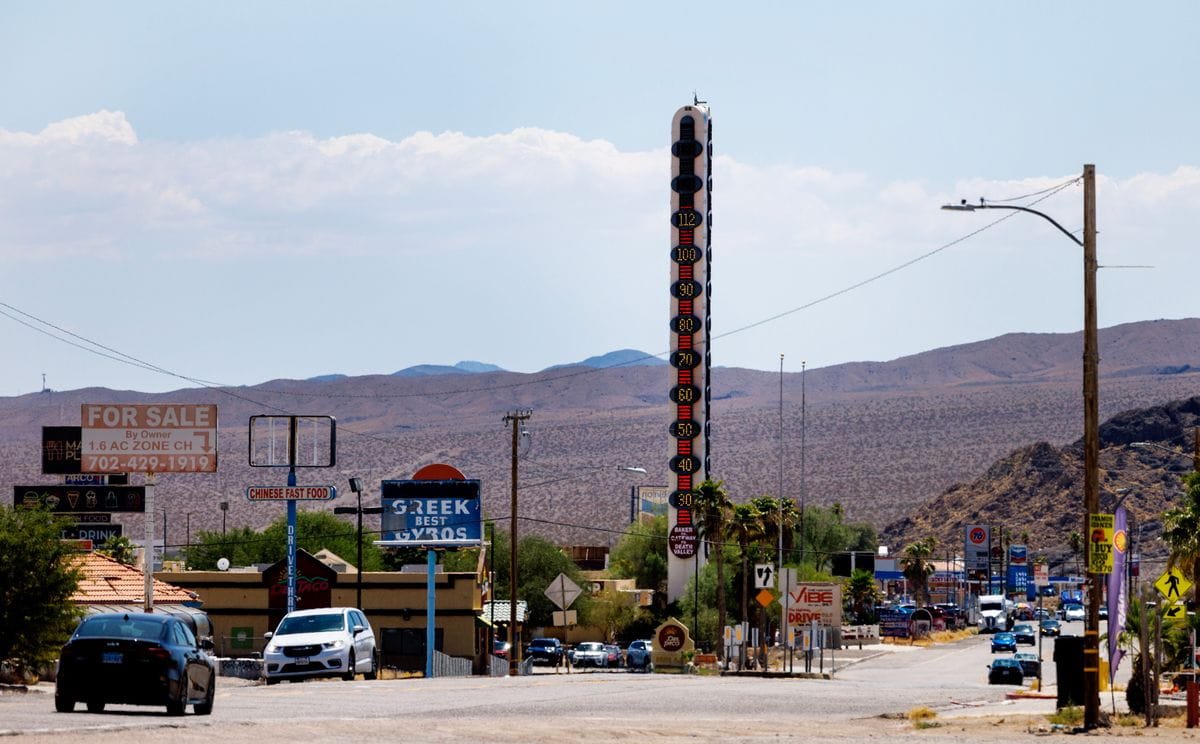 BAKER, CA - JULY 19, 2024: The World's Largest Thermometer reads 112 degrees as the heat wave continues in Southern California on July 19, 2024 in Baker, CA.(Gina Ferazzi / Los Angeles Times)