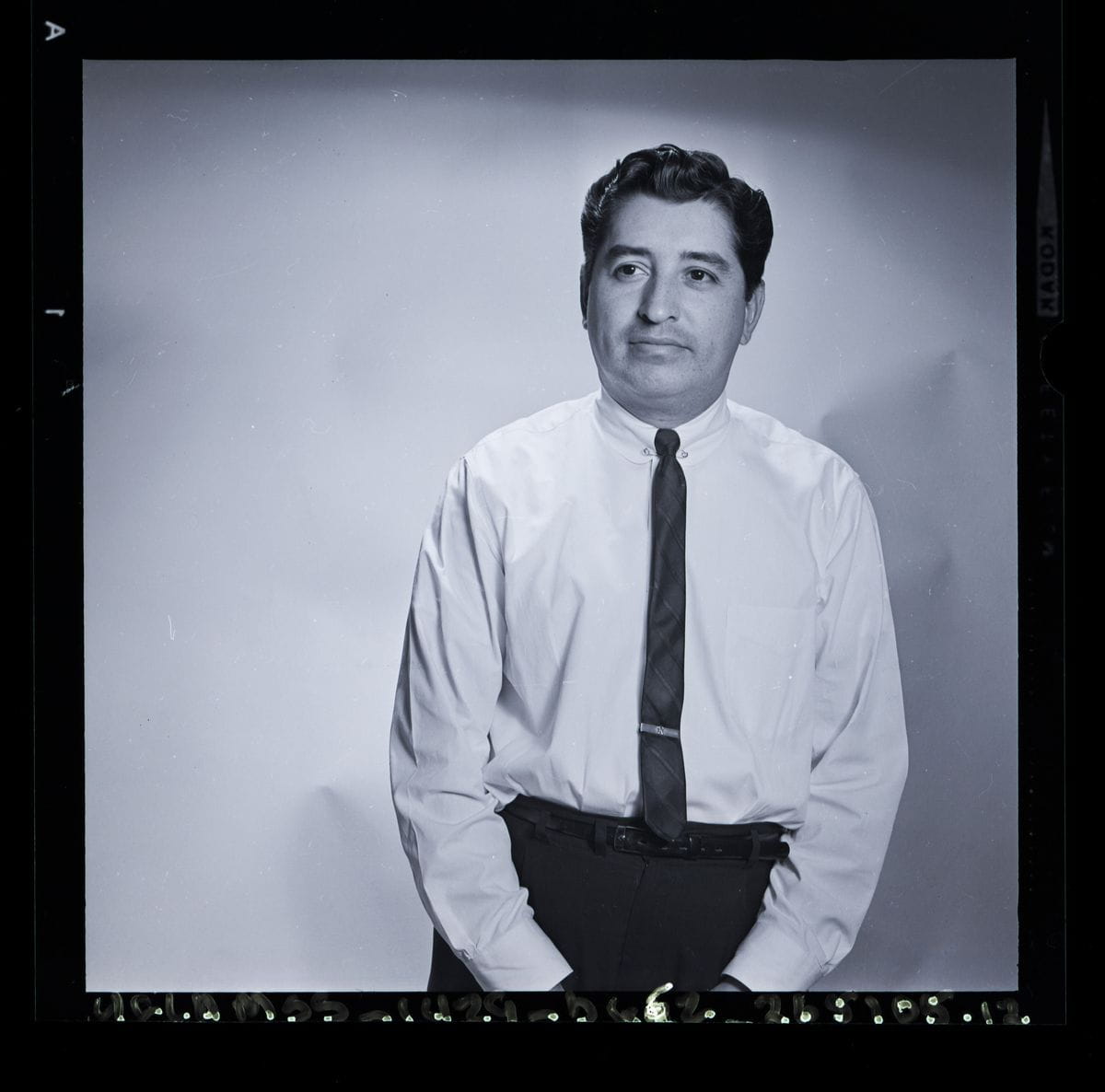 Ruben Salazar in his typical suit and tie.
