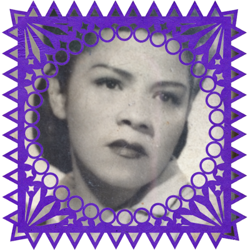 Photo of Abuelita Carmelita in a frame with papel picado.