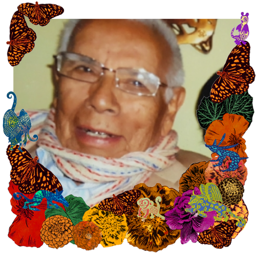 Photo of Abuelito in a frame with marigolds, flowers, alebrijes and monarch butterflies.