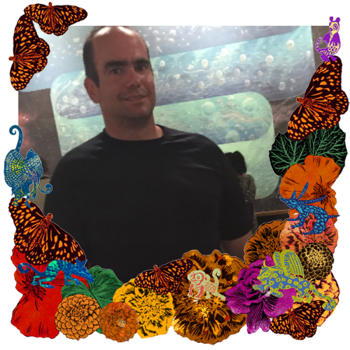 Photo of Alexander Christian Beirne in a frame with marigolds, flowers, alebrijes and monarch butterflies.