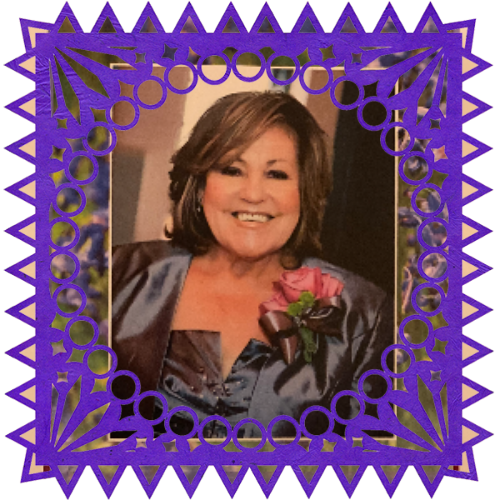 Photo of Alicia Monge in a frame with papel picado.