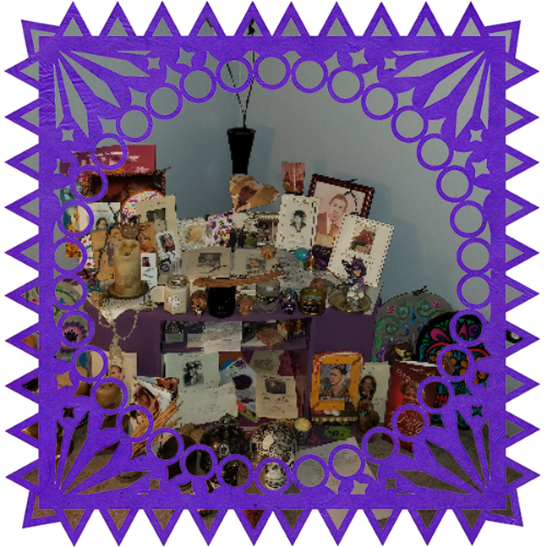 Photo of All my ancestors in a frame with papel picado.