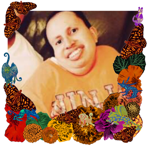 Photo of Andrew Gallo in a frame with marigolds, flowers, alebrijes and monarch butterflies.