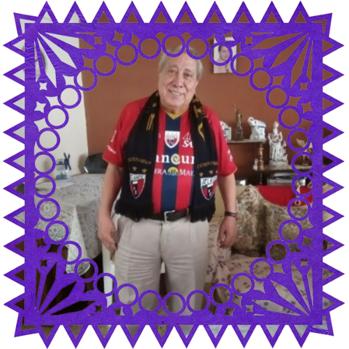 Photo of Angelito, el mejor abuelo in a frame with papel picado.