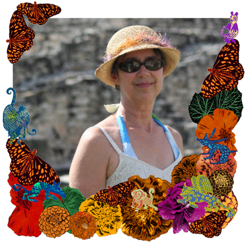 Photo of Anne Gilbert in a frame with marigolds, flowers, alebrijes and monarch butterflies.