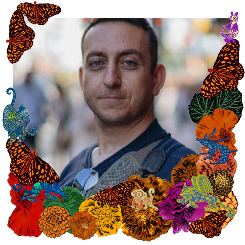 Photo of Armen Hovanesian in a frame with marigolds, flowers, alebrijes and monarch butterflies.