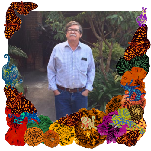 Photo of Arnoldo Del Toro in a frame with marigolds, flowers, alebrijes and monarch butterflies.