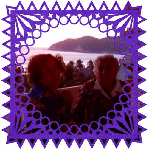 Photo of My beloved Abuelitas in a frame with papel picado.