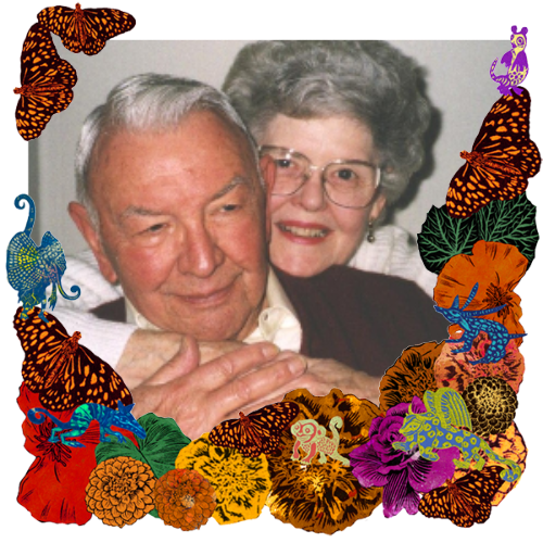 Photo of Bette and Al Kray in a frame with marigolds, flowers, alebrijes and monarch butterflies.