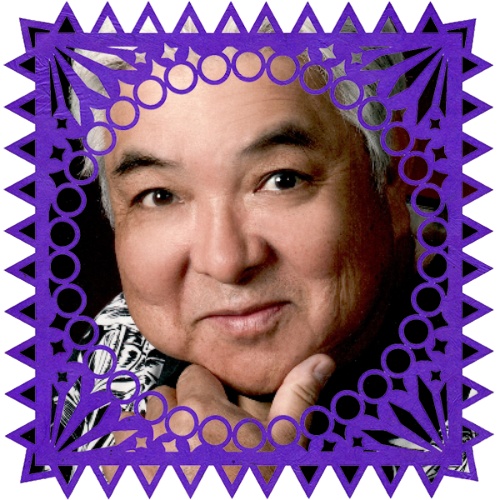 Photo of Brian Tatsuno in a frame with papel picado.