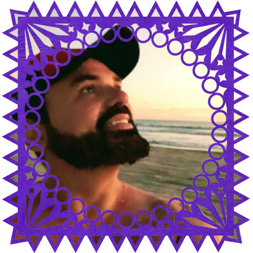 Photo of Carlos Arguello in a frame with papel picado.