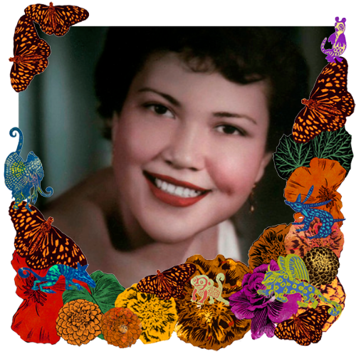 Photo of Carolina Torres in a frame with marigolds, flowers, alebrijes and monarch butterflies.