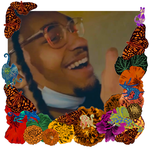 Photo of Christopher Micheal Hodge in a frame with marigolds, flowers, alebrijes and monarch butterflies.