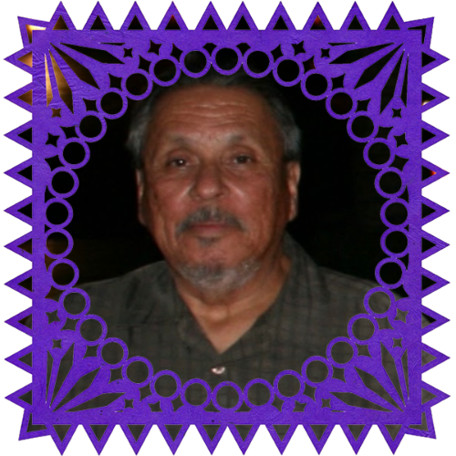 Photo of Mike "Chuito" Morales in a frame with papel picado.