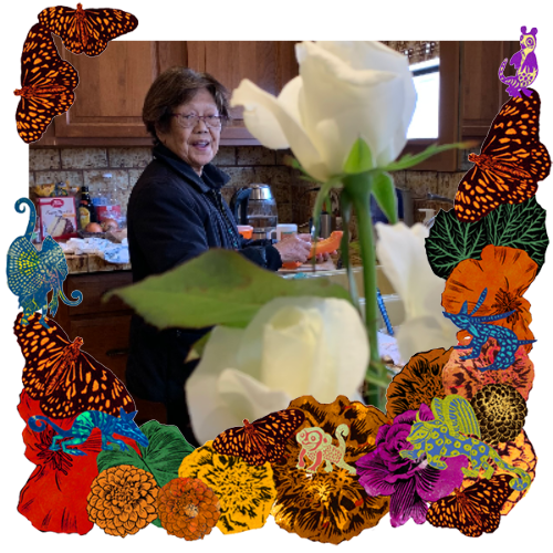 Photo of Cleody Manalo in a frame with marigolds, flowers, alebrijes and monarch butterflies.