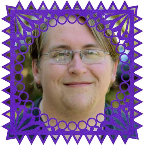 Photo of My older brother, Clinton in a frame with papel picado.