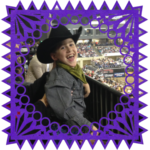 Photo of ConCon in a frame with papel picado.