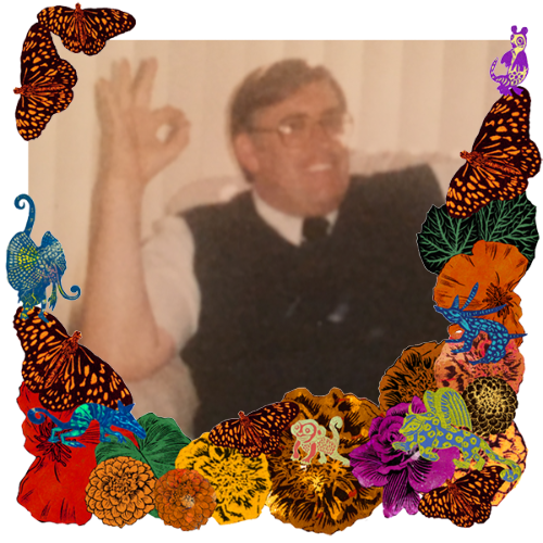 Photo of Darrell Albers in a frame with marigolds, flowers, alebrijes and monarch butterflies.