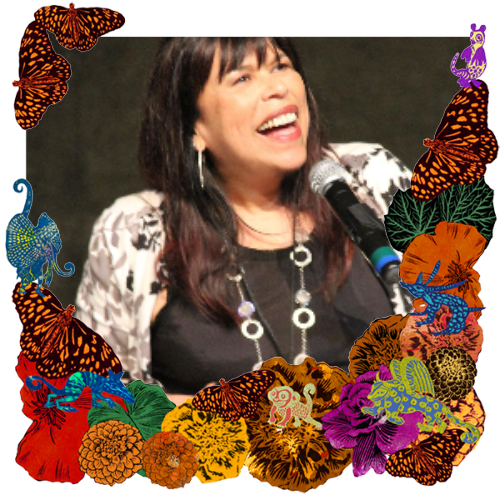 Photo of Diane Rodriguez in a frame with marigolds, flowers, alebrijes and monarch butterflies.