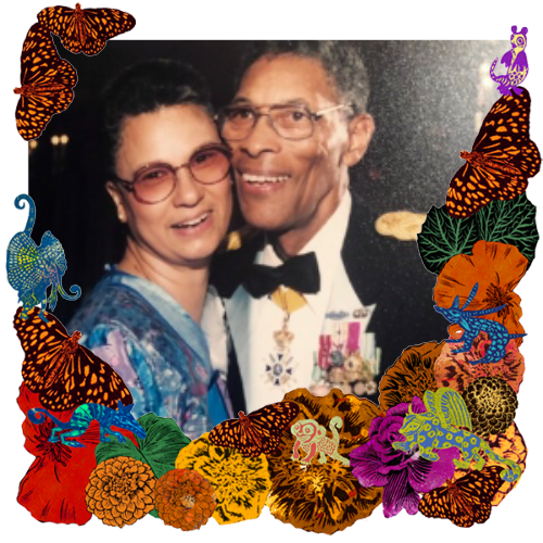 Photo of Don and Myrtle Phillips in a frame with marigolds, flowers, alebrijes and monarch butterflies.