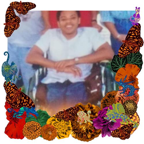 Photo of Donny Hannon in a frame with marigolds, flowers, alebrijes and monarch butterflies.
