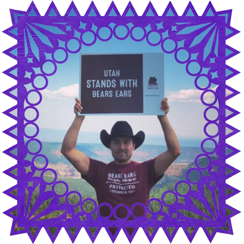 Photo of Dr. Garon Coriz in a frame with papel picado.