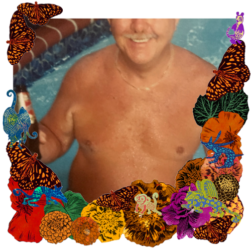 Photo of Edmund Peterson in a frame with marigolds, flowers, alebrijes and monarch butterflies.
