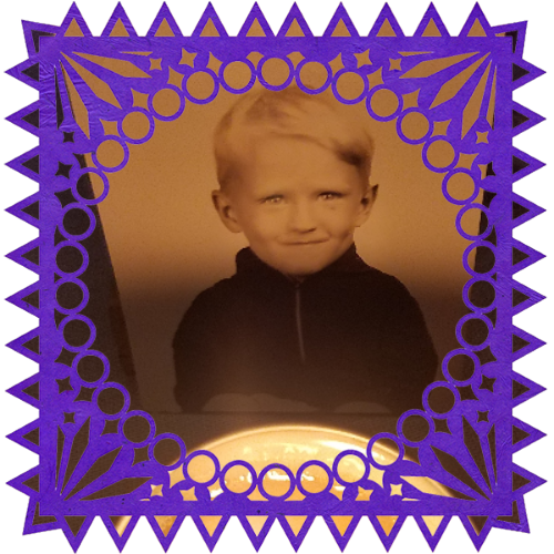 Photo of Edward Goodwin Knowles in a frame with papel picado.