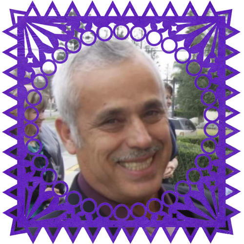 Photo of Emilio Robles in a frame with papel picado.