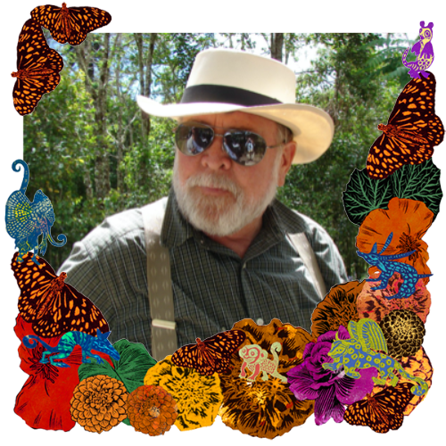 Photo of Ernie Vogt in a frame with marigolds, flowers, alebrijes and monarch butterflies.