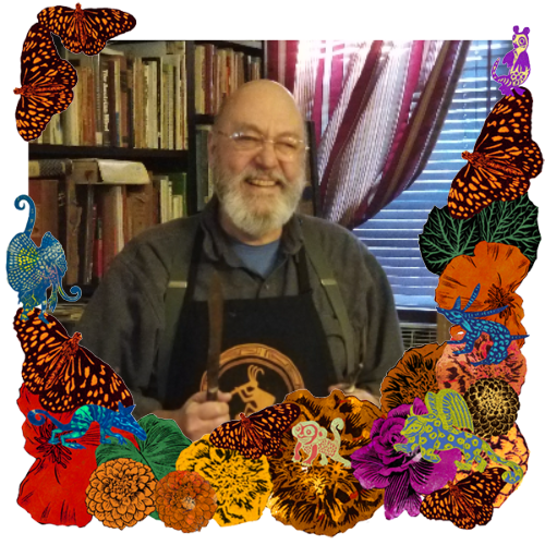 Photo of Frank Rocca in a frame with marigolds, flowers, alebrijes and monarch butterflies.