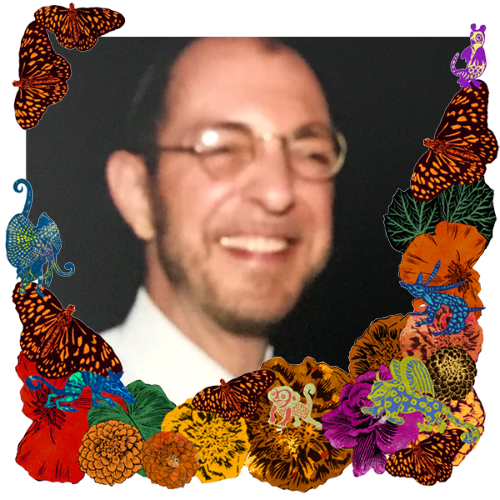 Photo of Gerard Widdershoven in a frame with marigolds, flowers, alebrijes and monarch butterflies.