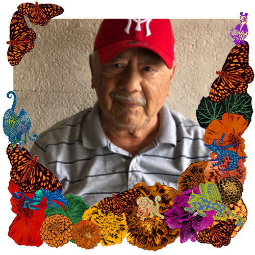Photo of Gilbert Torres in a frame with marigolds, flowers, alebrijes and monarch butterflies.