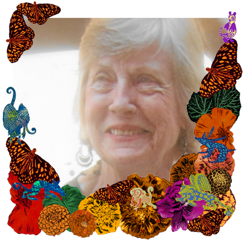 Photo of Gloria in a frame with marigolds, flowers, alebrijes and monarch butterflies.