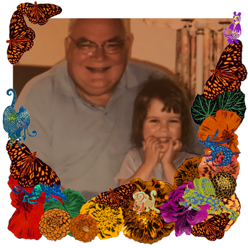 Photo of Grandpa Howard in a frame with marigolds, flowers, alebrijes and monarch butterflies.