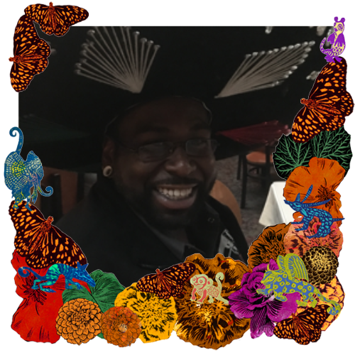 Photo of My Husband Henry in a frame with marigolds, flowers, alebrijes and monarch butterflies.