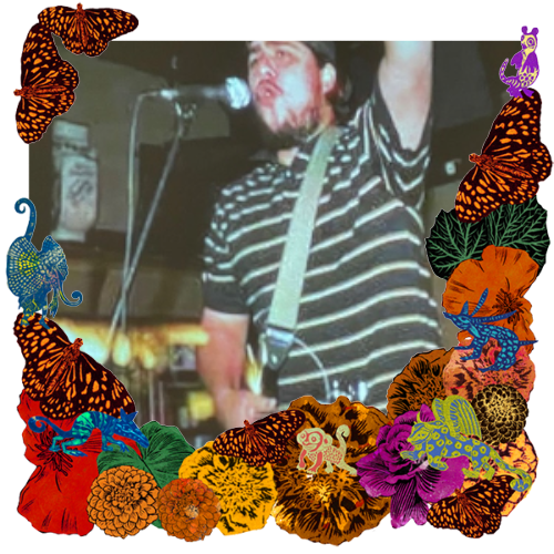 Photo of Israel "Izzy" Acosta in a frame with marigolds, flowers, alebrijes and monarch butterflies.