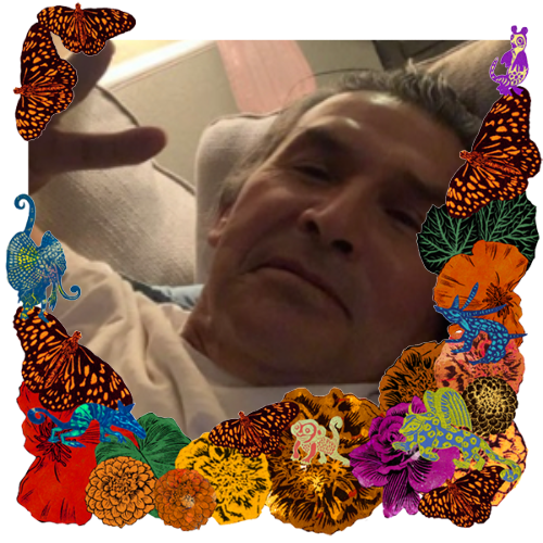 Photo of JB in a frame with papel picado.