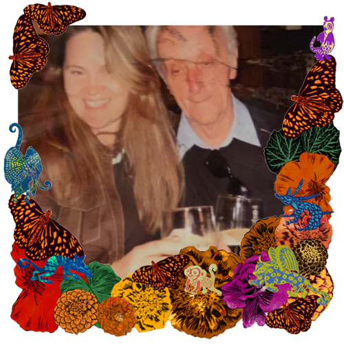 Photo of John Edward Gannon in a frame with marigolds, flowers, alebrijes and monarch butterflies.