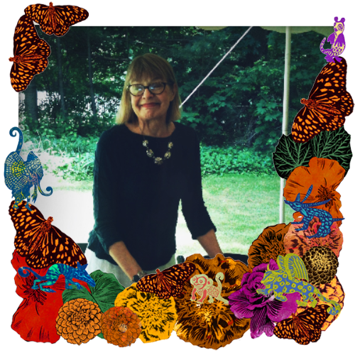 Photo of Jennifer Kochman in a frame with marigolds, flowers, alebrijes and monarch butterflies.
