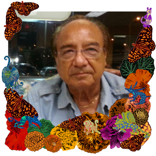 Photo of Jesus De León in a frame with marigolds, flowers, alebrijes and monarch butterflies.