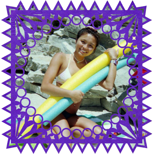 Photo of Jil in a frame with papel picado.