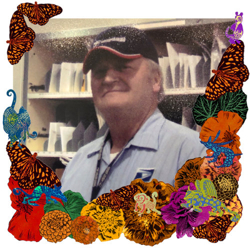 Photo of John in a frame with marigolds, flowers, alebrijes and monarch butterflies.